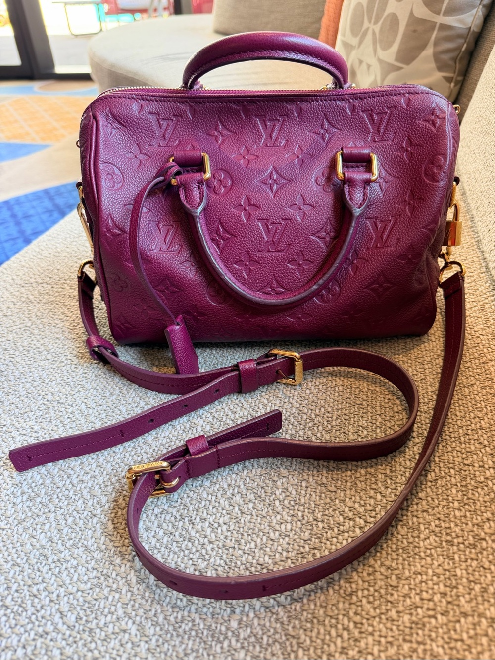 Louis Vuitton Monogram Empreinte Speedy Bandoulière 25 burgundy aurore